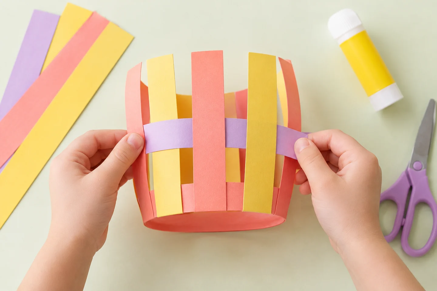 A paper strip passing over and under the vertical basket sections