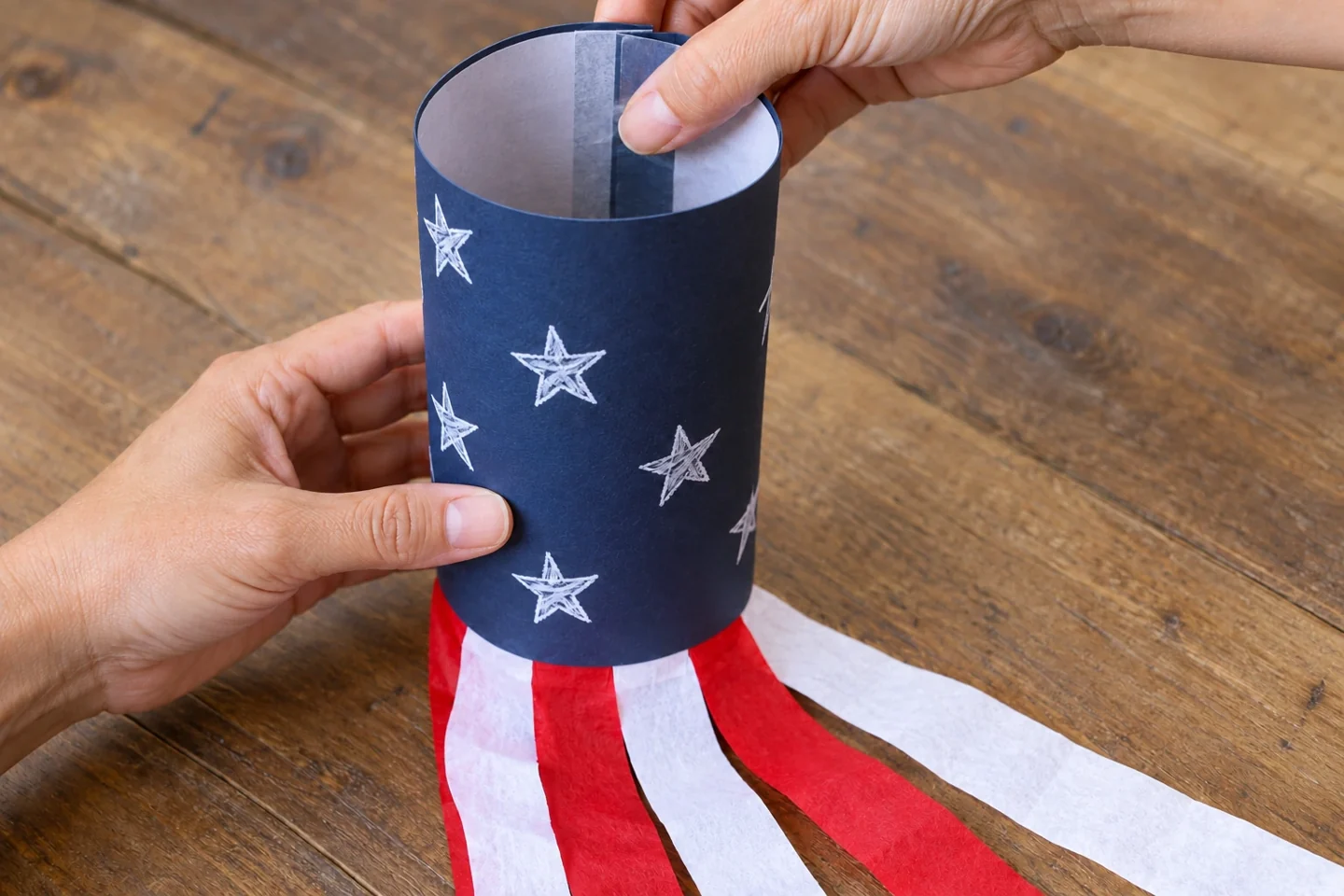 Navy sheet rolled into a broad cylinder with short edges overlapping by 2 cm